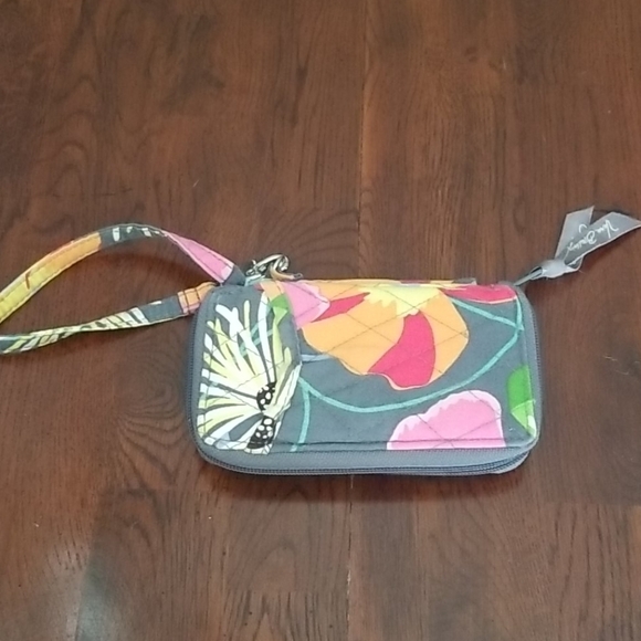 Vera Bradley Handbags - Vera Bradley zip around wristlet wallet. Like new
